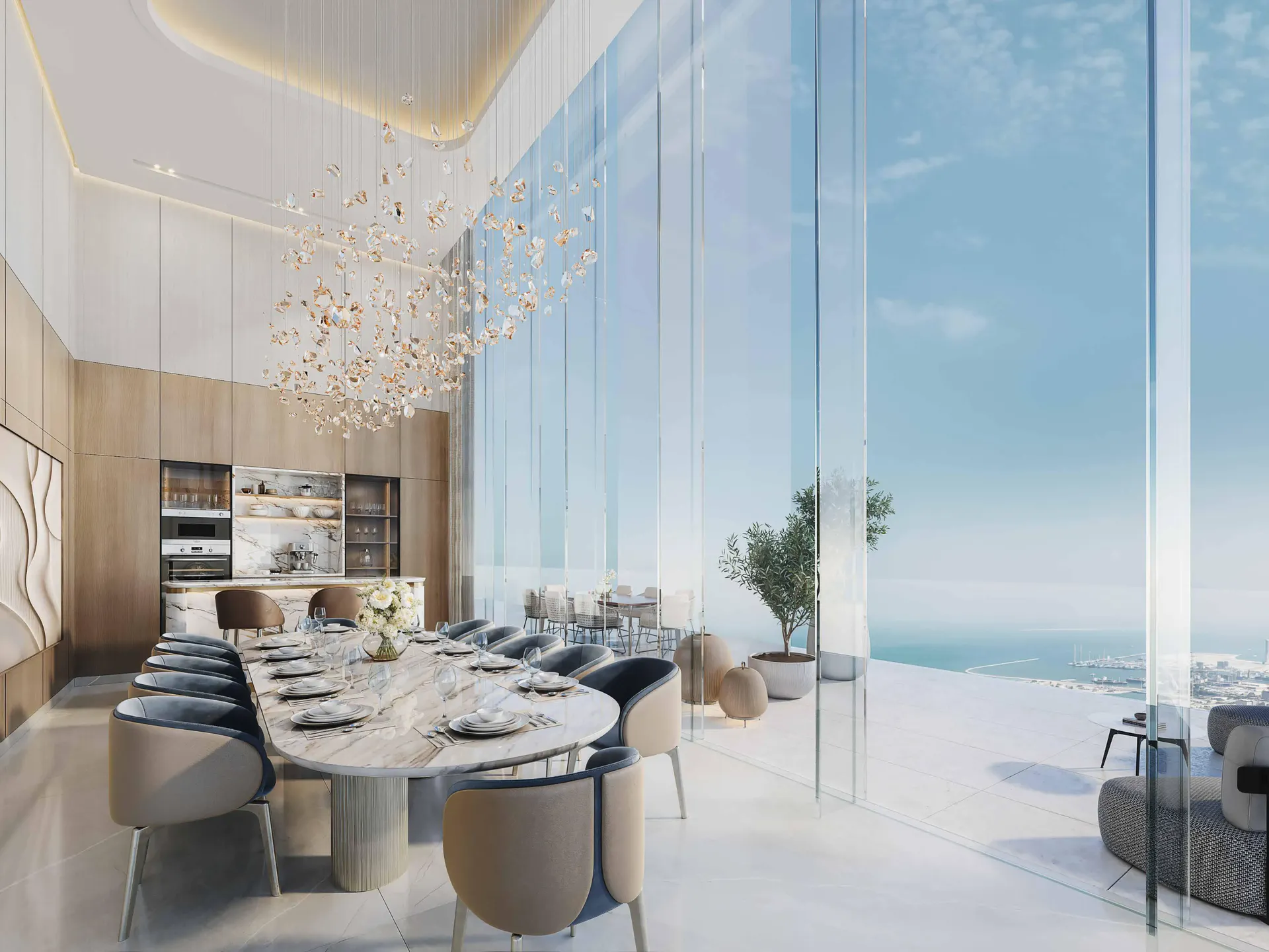 Sala de jantar com pé-direito duplo e vista para o mar